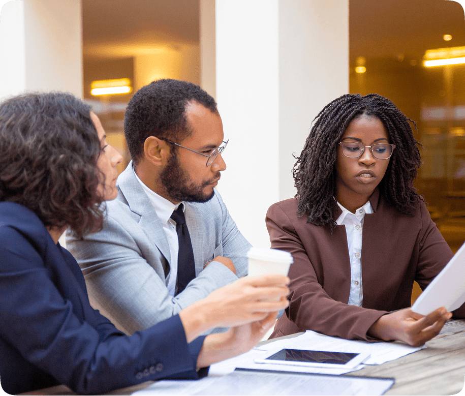 Healthcare professionals discussing project details